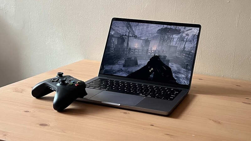 macbook with game controller