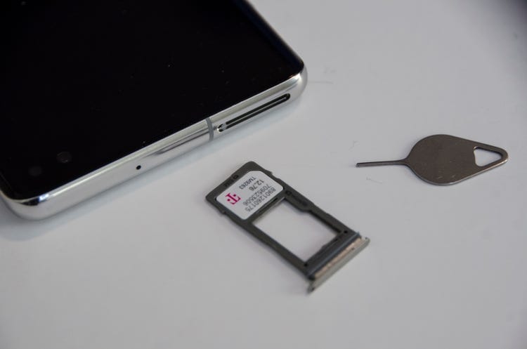 remove the sim and memory card