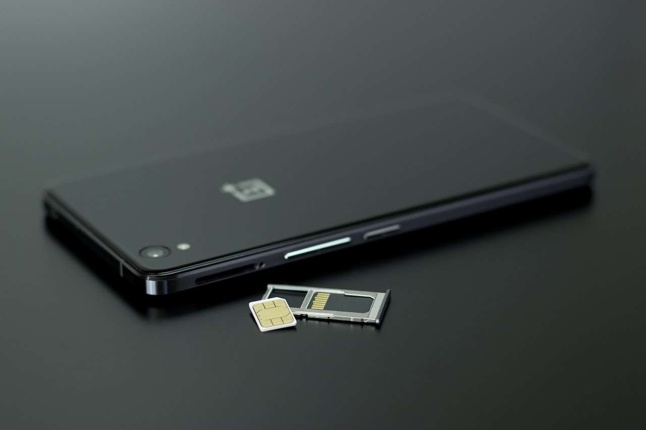 Remove sim and sd cards