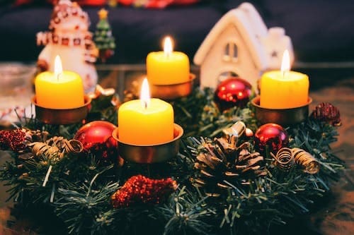 candles with Christmas backdrop