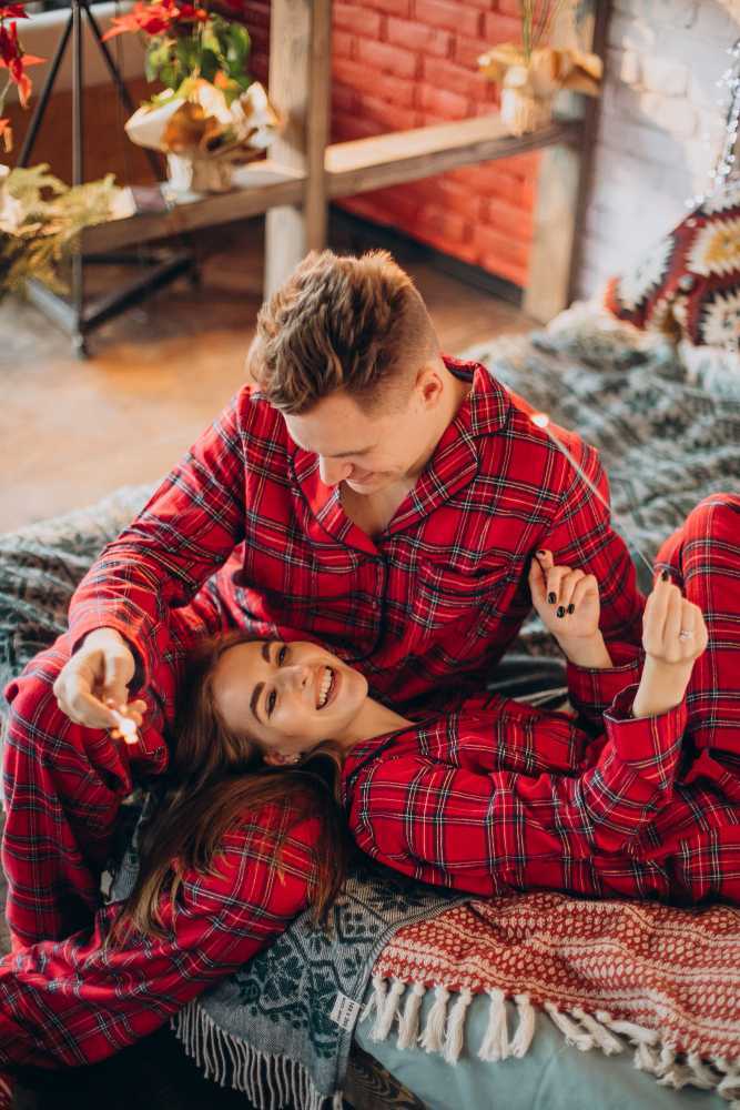 couple wearing matching pajamas