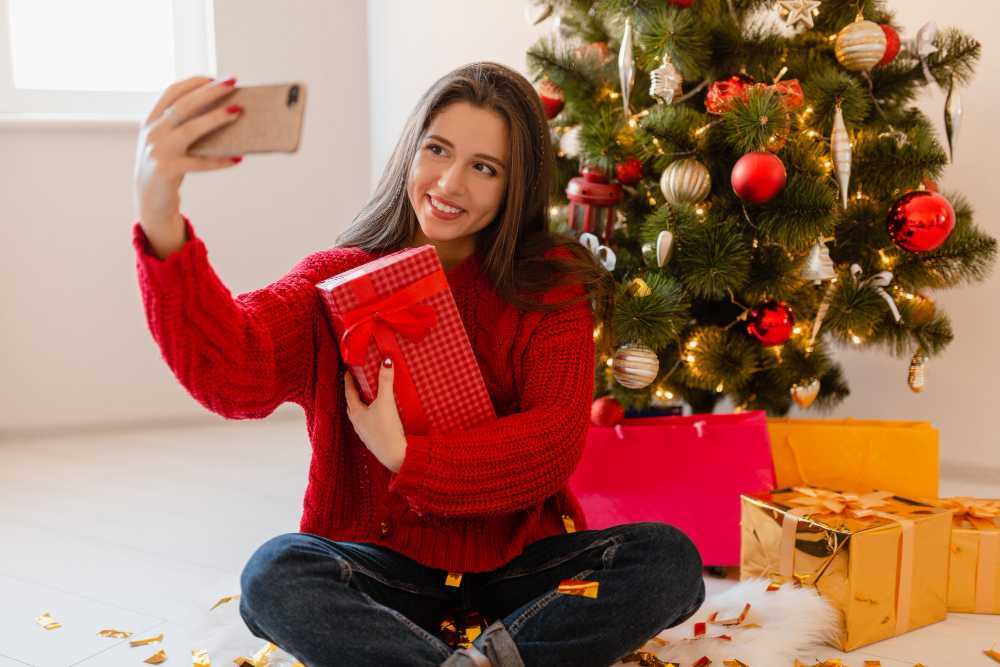 woman taking a christmas selfie