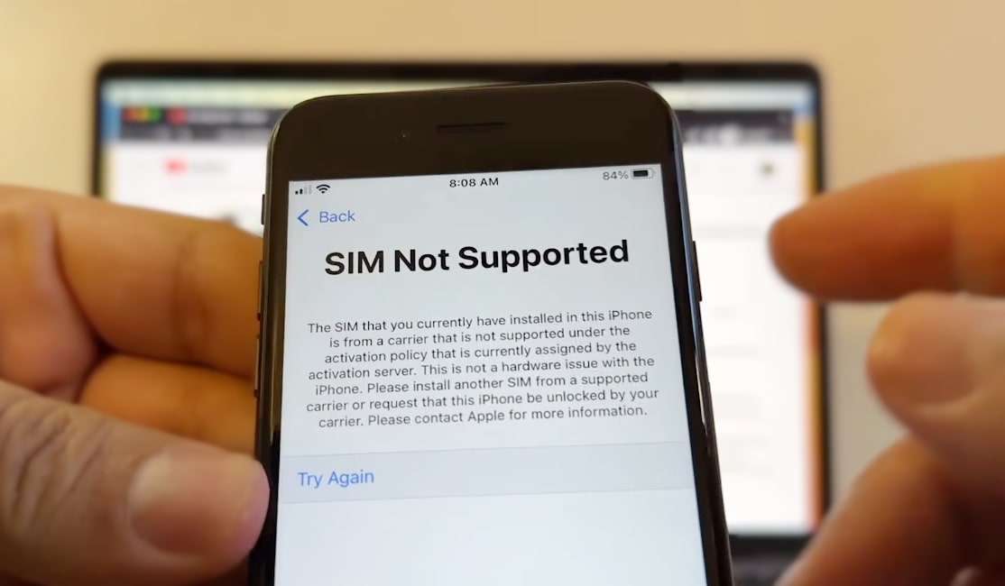 Carrier locked iPhone showing SIM Not Supported message.