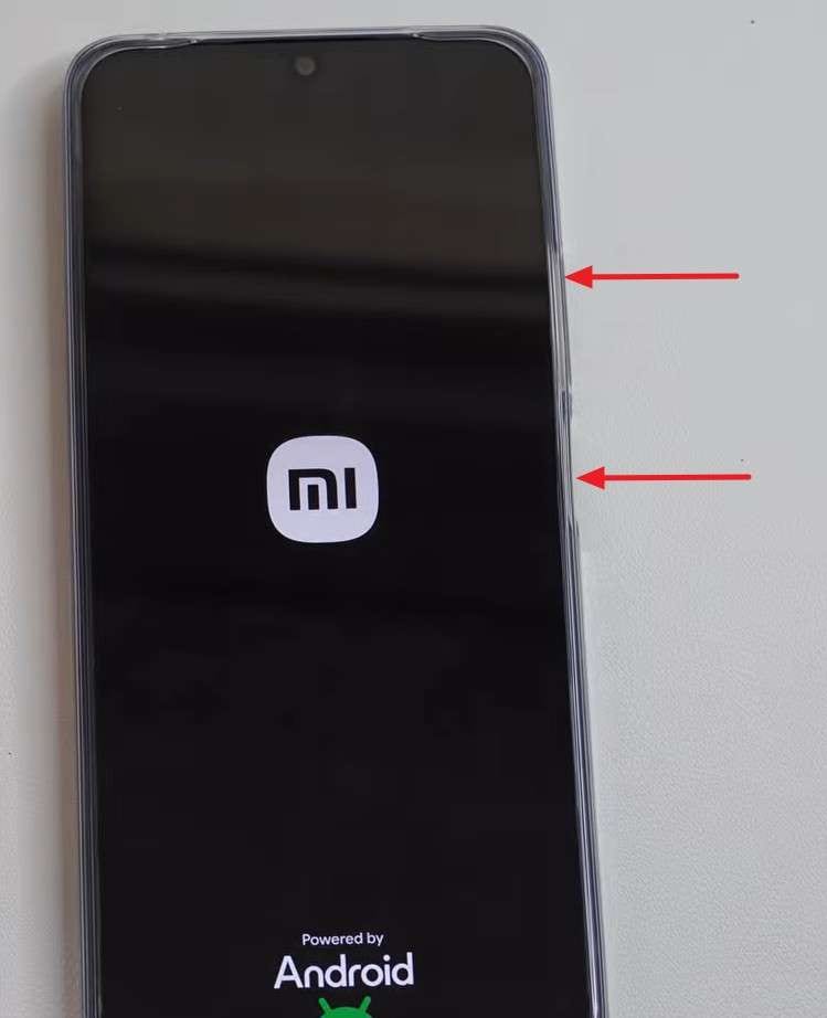 press the button to reboot mi