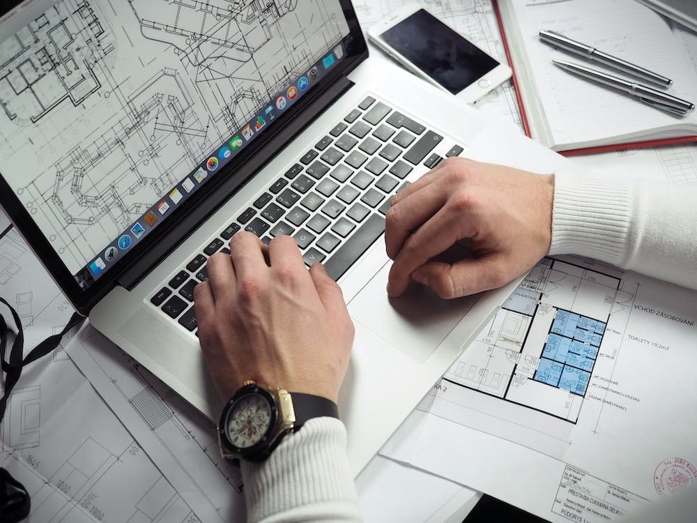 person working on floor plan template