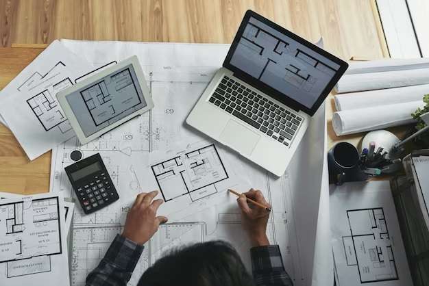 person drawing house plans on laptop