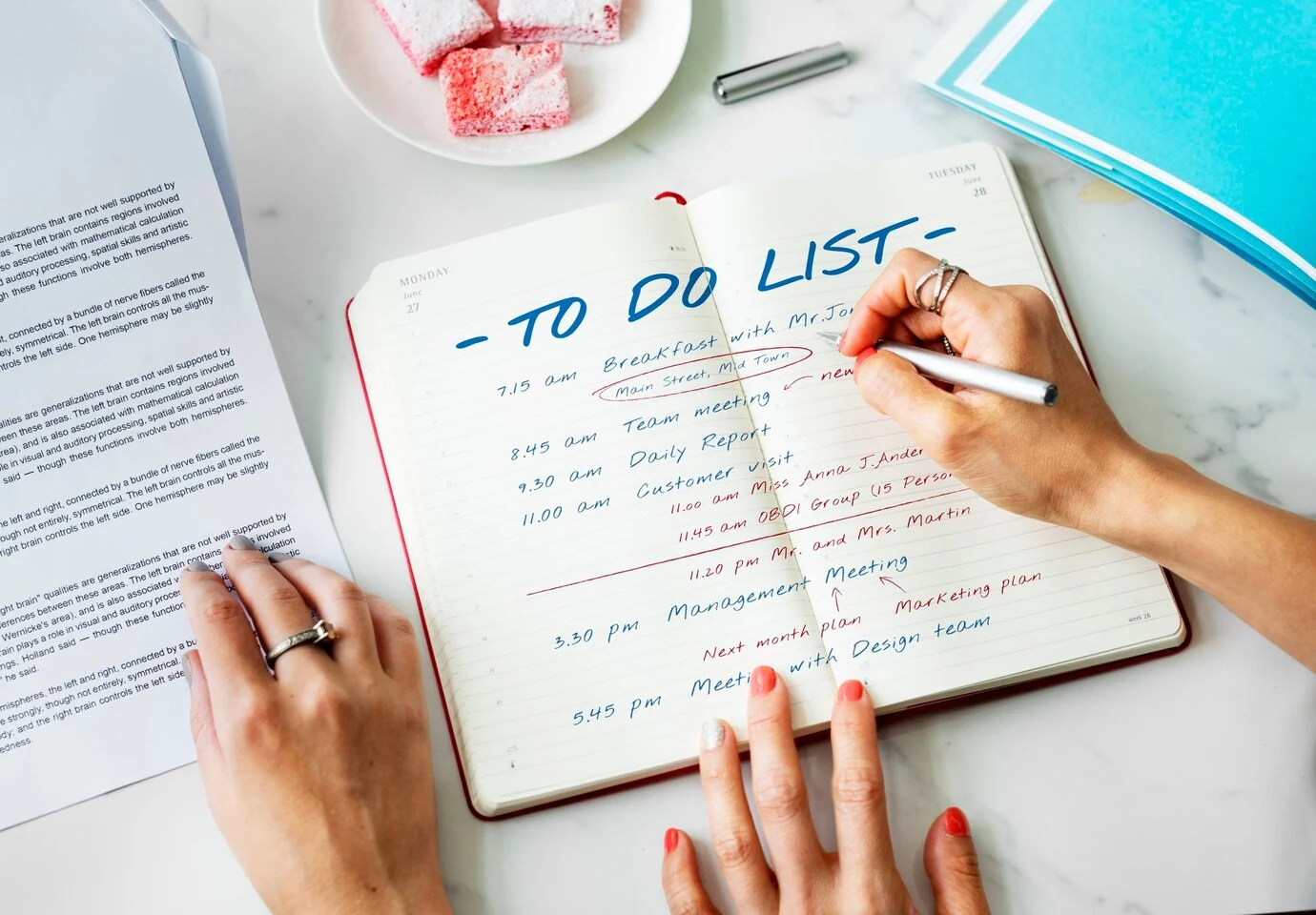 handwritten to-do list on notebook