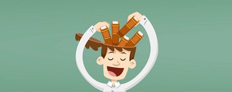 boy with books on head-cramming