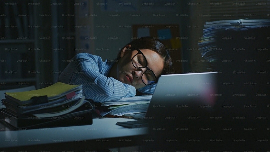 sleeping on desk-working