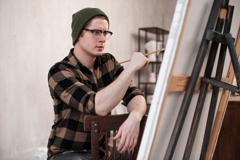 painter with canvas