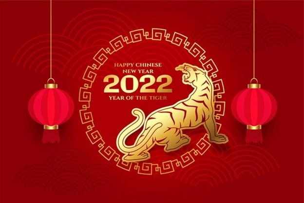 Happy Chinese New Year 2022 card design with the traditional Chinese red and gold, highlighting the Tiger of the Chinese Zodiac