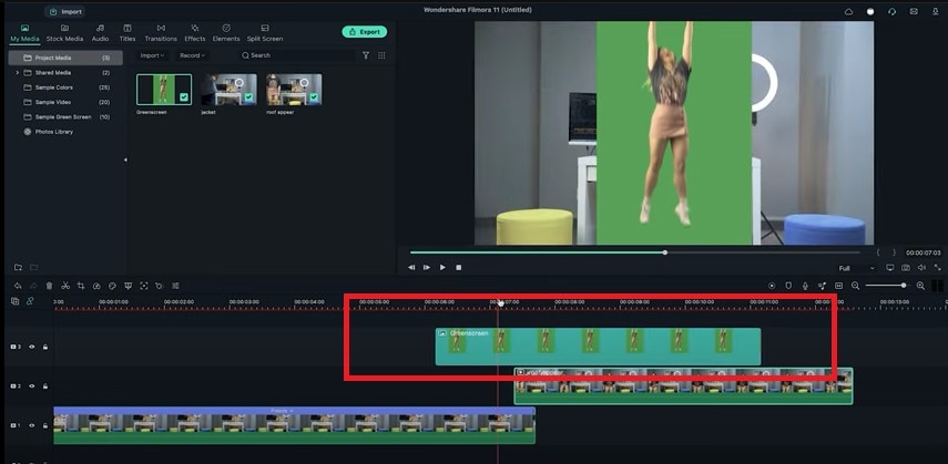 add the green screenshot onto the third video track