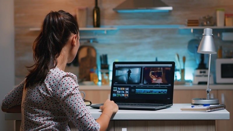 woman back view video editing