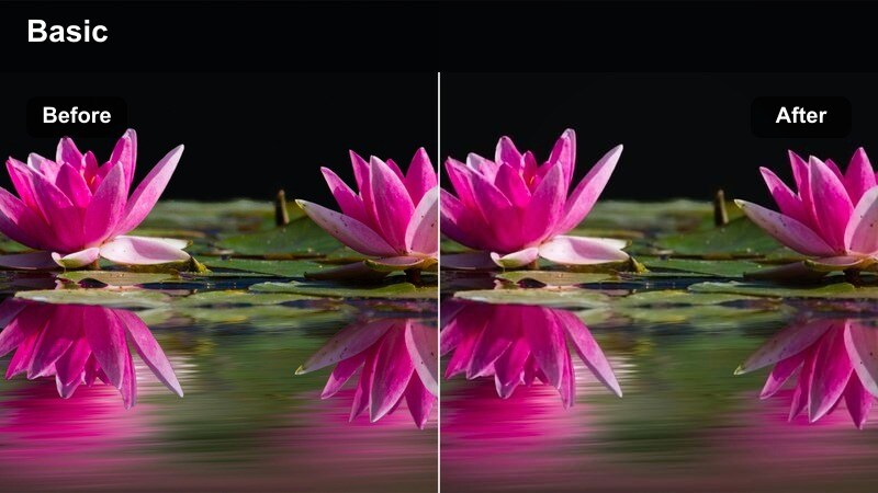 Fashion model posing on city rooftop with dramatic warm and cool contrast.