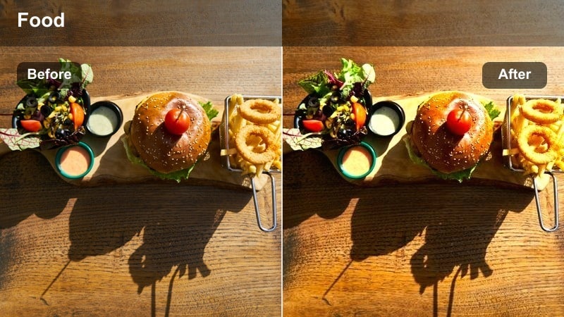 Overhead restaurant table shot with menus and glasses lit by amber warm light.