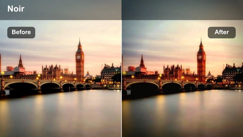 Person walking across a steel city bridge with strong shadows and high contrast.