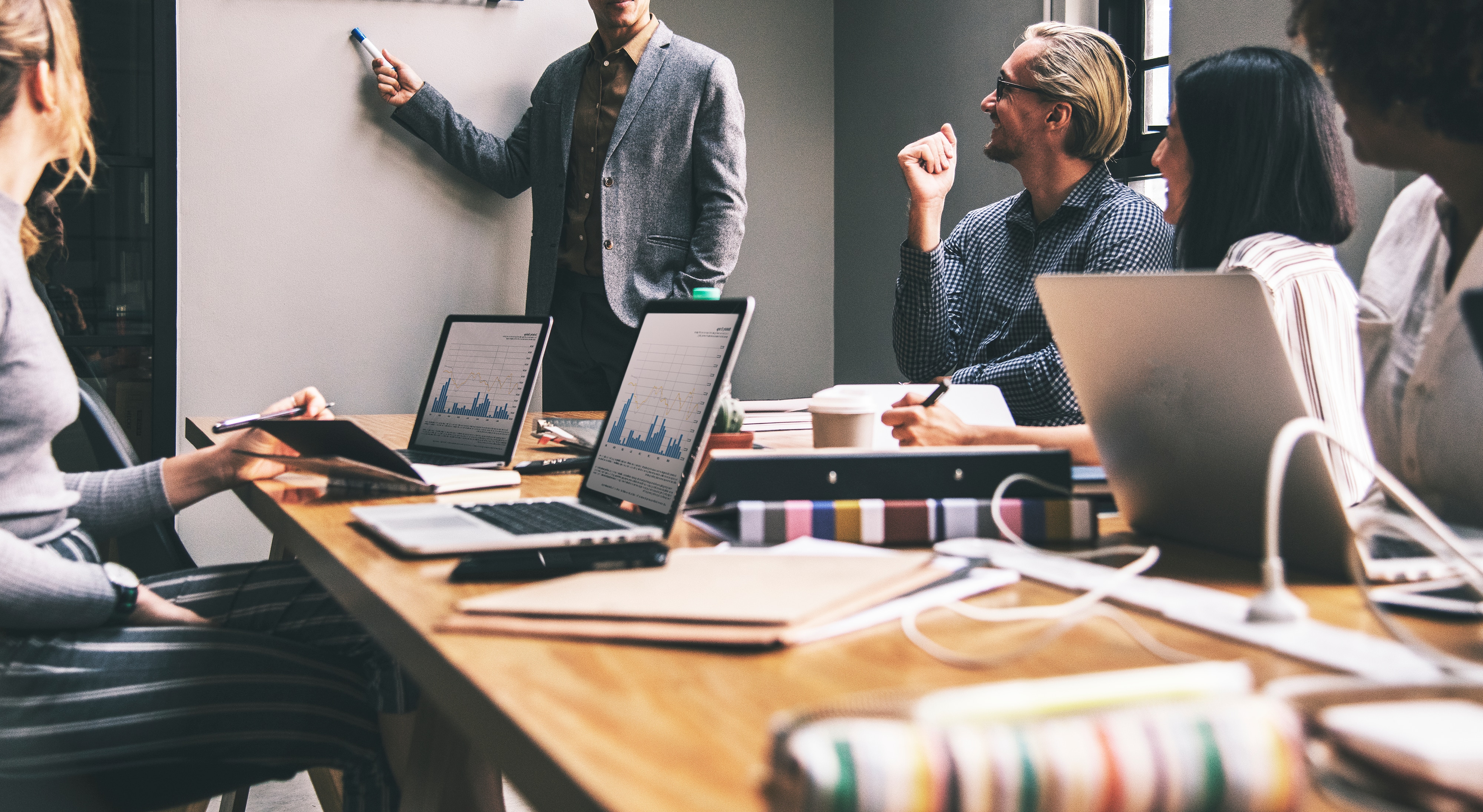 preparing a business invitation during meeting