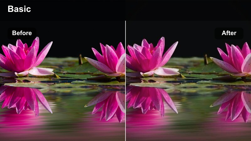 Night city highway with car lights reflecting on wet asphalt and cool tones.