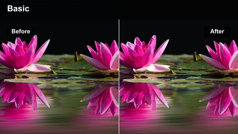Wide shot of a city skyline at night with glowing windows and colorful lights