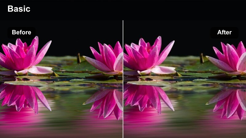 Fashion influencer in a sparkly dress on a rooftop with glowing city lights behind.