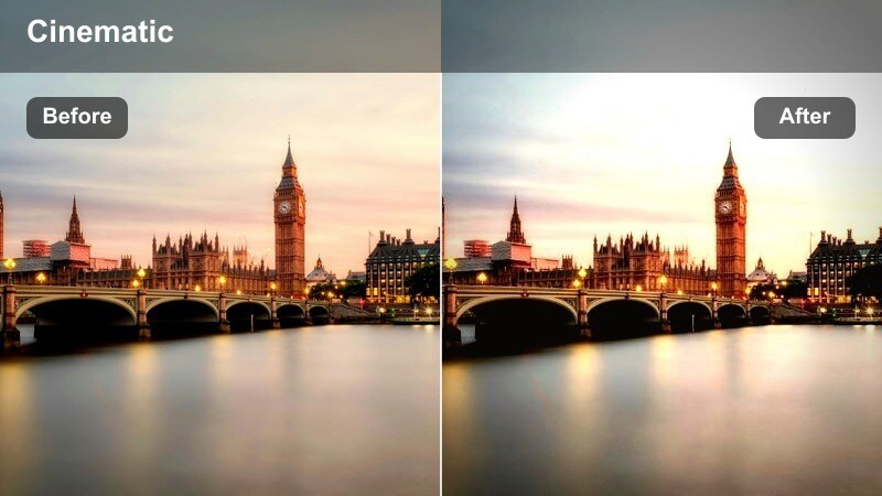 Person working late at a desk with a large window showing a softly glowing downtown skyline.