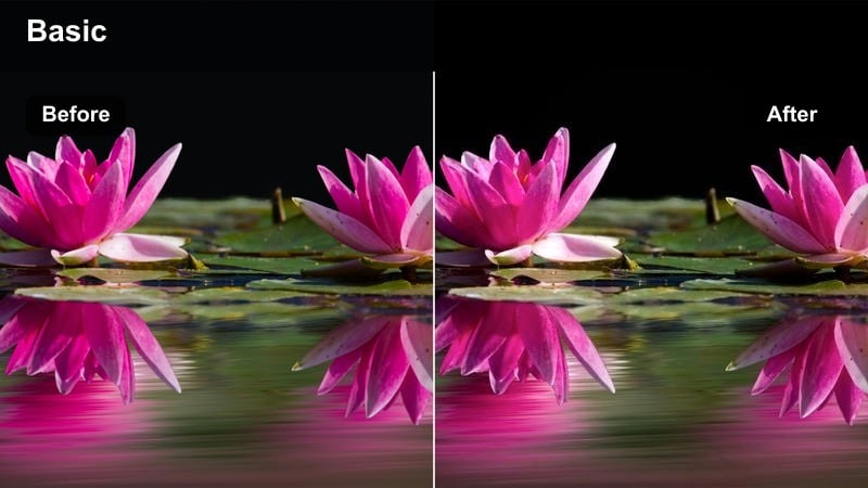 Minimal white bedroom with a person smoothing out a duvet in soft daylight.