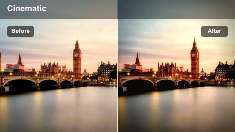 Blue-hour city skyline with deep cobalt sky above illuminated buildings