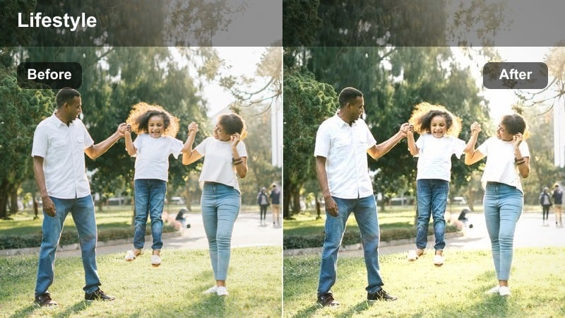 Indoor living room with a person sitting on a couch lit by TV glow in a dim space.