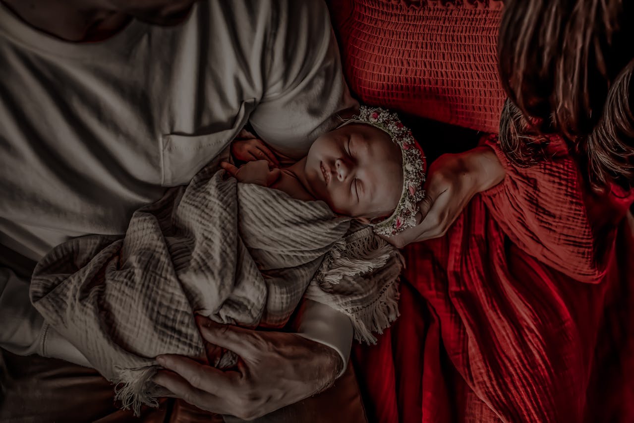 baby with mother and father