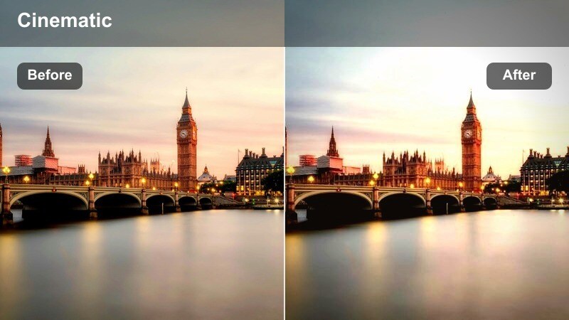 View from an elevated city train with glowing window reflections and a sunset skyline in the background.