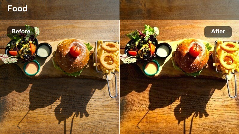 Server carrying plates through a softly lit restaurant with warm evening color grade