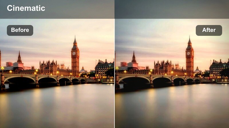 Foggy city skyline with tall buildings partially hidden by mist.