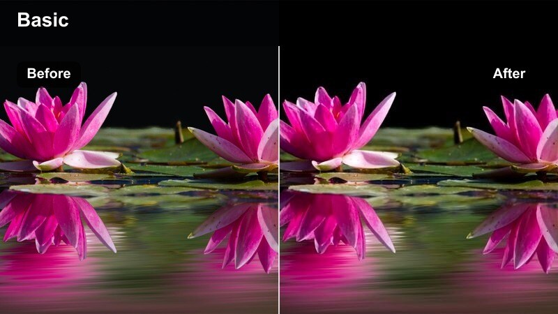 Content creator walking down a softly lit hallway holding keys.