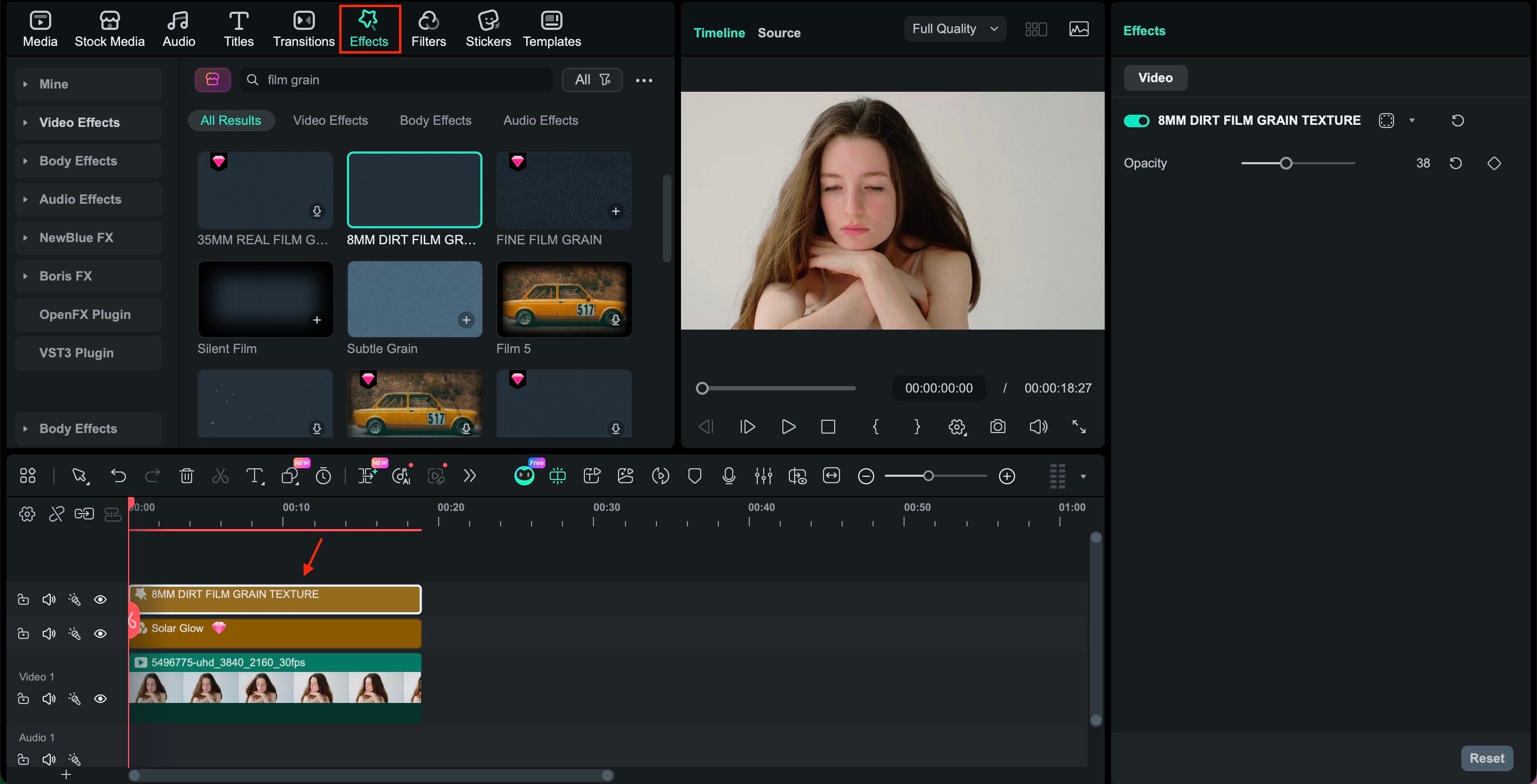 apply a film grain effect to the clip