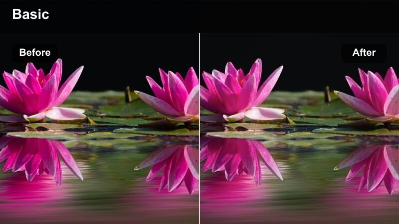 Creator vlogging in a modern kitchen with clean, natural skin tone under overhead lights.