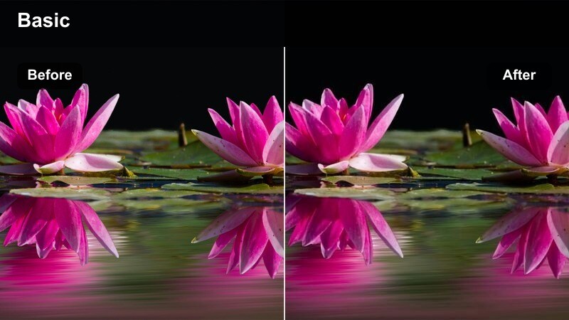 Creator grabbing a snack from the fridge in a dim kitchen while filming a short video.