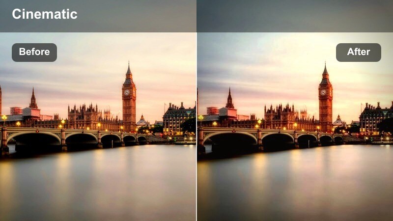 Night rooftop scene with cool blue tones and softly lit buildings in the background.