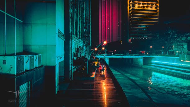 Bright neon glow filter effect in Filmora applied to a city night scene