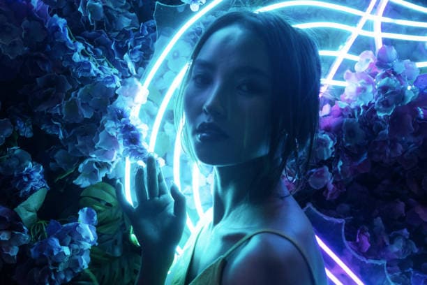 Electric blue neon lighting filter in Filmora for nightlife video scenes