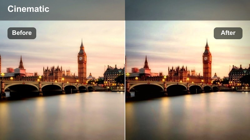 Rainy city intersection at night with neon reflections stretching across wet asphalt and car light trails.