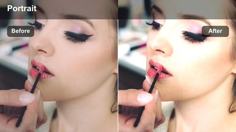 Portrait of a person by a city shop window at night with neon reflections coloring the glass.