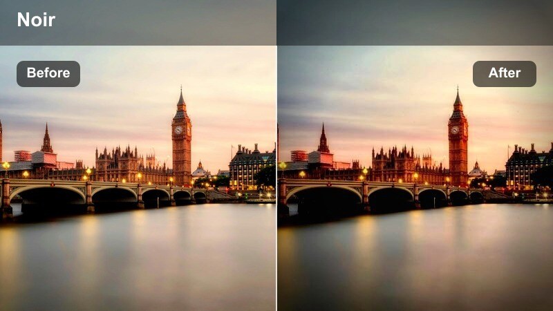 High-contrast night city skyline with deep blue shadows and bright windows