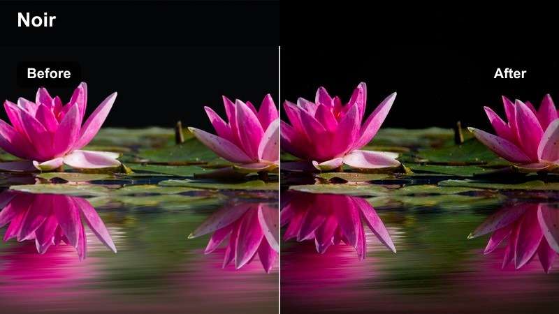 Drone overhead shot of a dark city street at night with high-contrast noir cinematic tones.