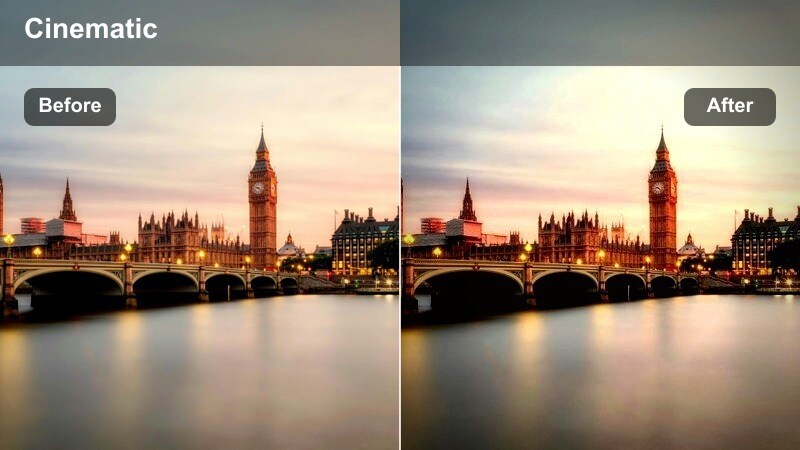 Person walking through a dimly lit downtown parking garage with harsh fluorescent lighting.