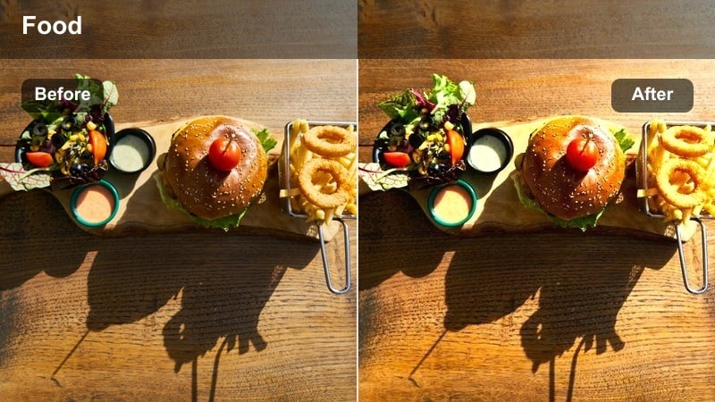 Close handheld shot of a plated meal on an indoor restaurant table.