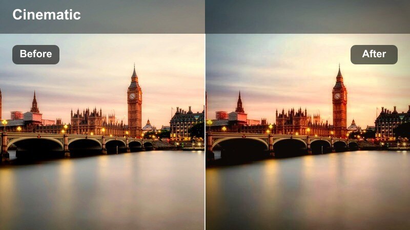 City cyclist riding on wet pavement with colorful reflections from streetlights.
