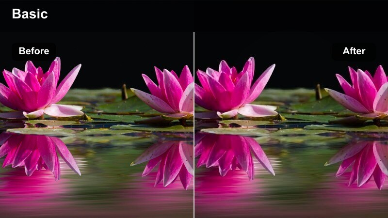 Night city street in the rain with reflections of lights on wet pavement.