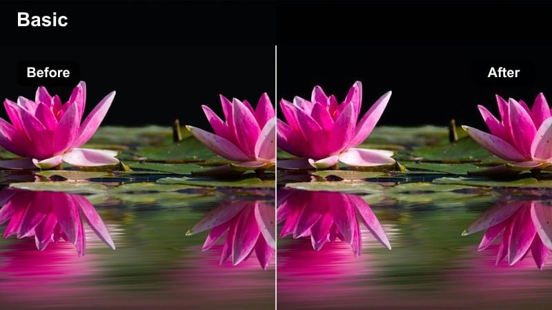 Wide rooftop view of a city with strong edge highlights and deep shadows.