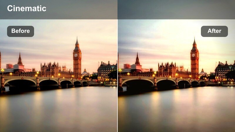 City skyline at blue hour with glowing windows and cool-toned buildings.