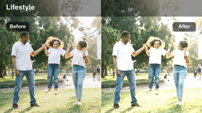 Creator filming a personal vlog by a bright window with soft, warm tones.